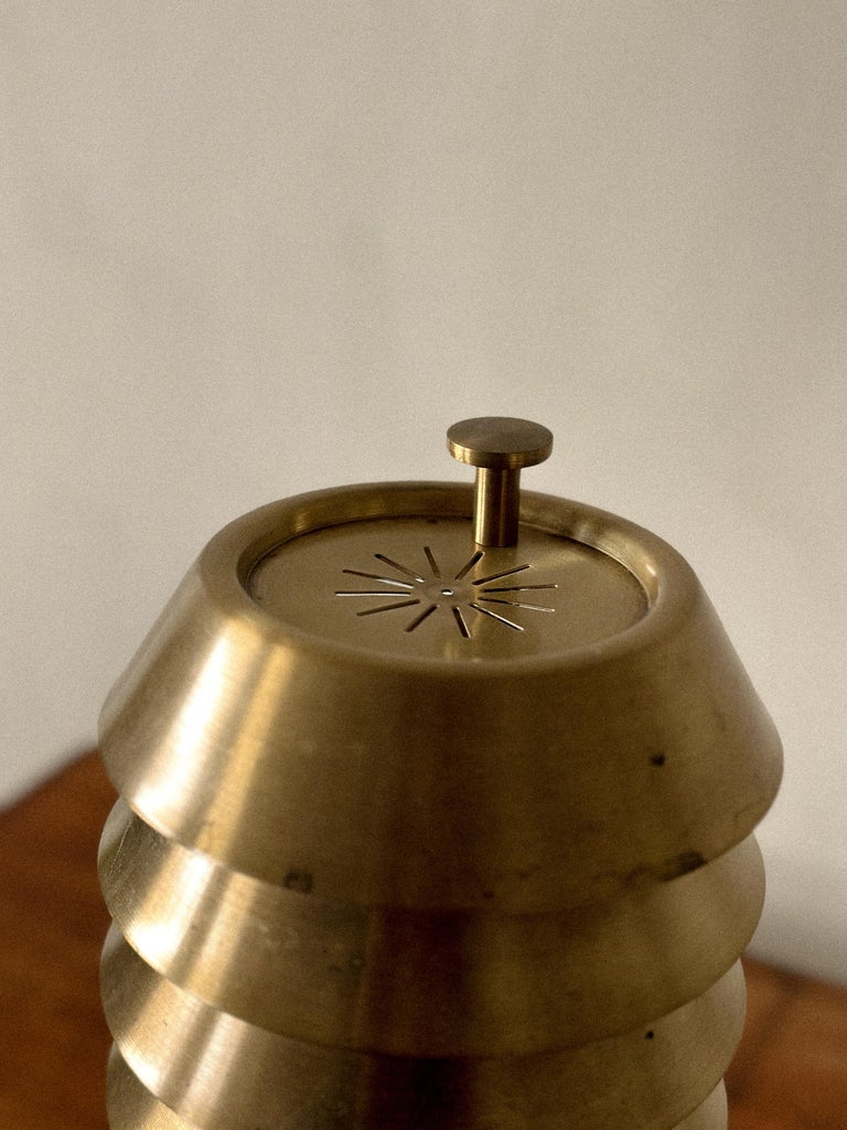Brass table lamp with aged finish and sculptural base