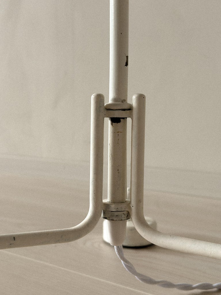 Finnish floor lamp with minimalist lines and textured shaft