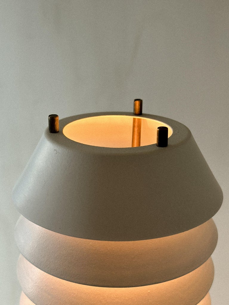 Top detail of louvered shade on Maija the Bee lamp