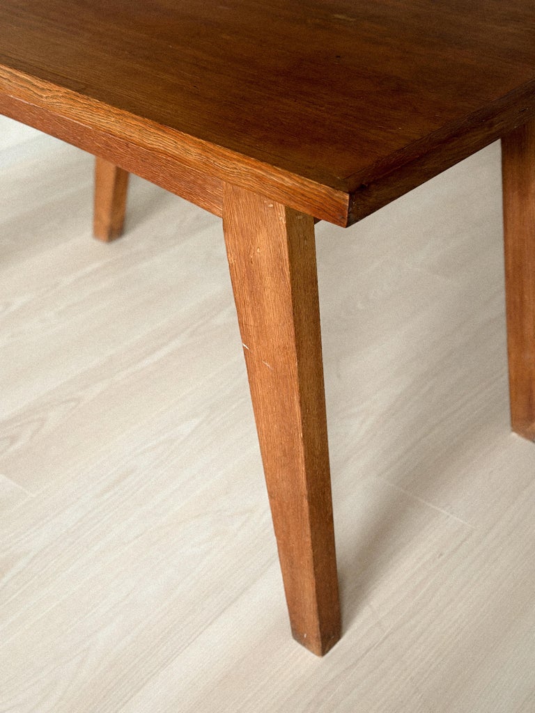 Oak dining table styled with minimalist decor