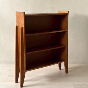 Mid-century oak veneer bookshelf with angular side panels