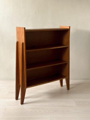 Mid-century oak veneer bookshelf with angular side panels