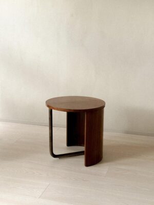 Vintage French table with round top and sculptural side profile