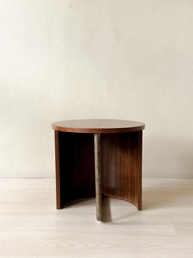 Modernist side table with asymmetric wood and metal design