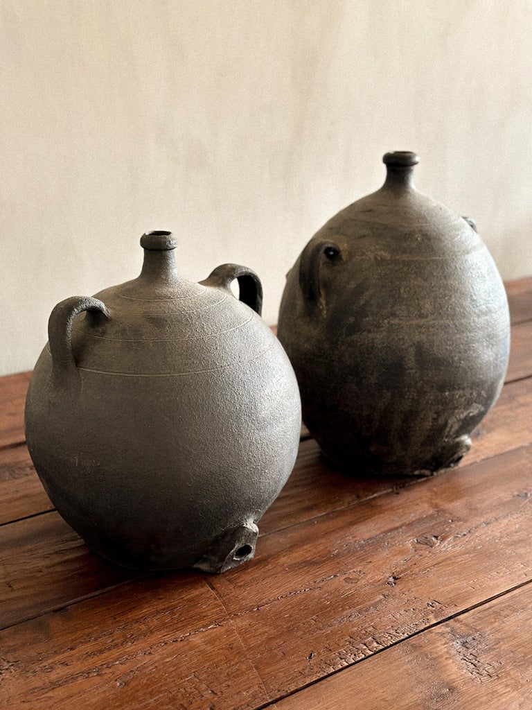 Wabi Sabi pottery pair with irregular glazing and sculptural quality