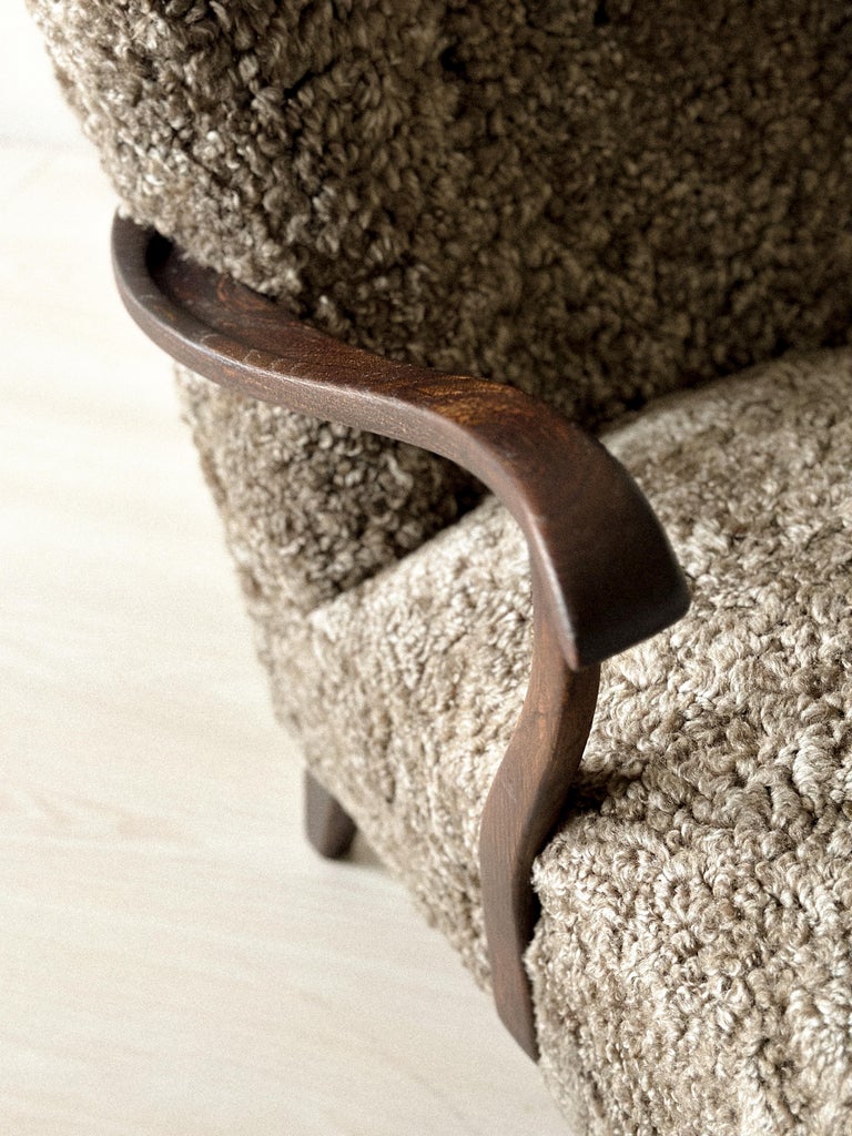 Textured sheepskin upholstery on vintage Danish armchair