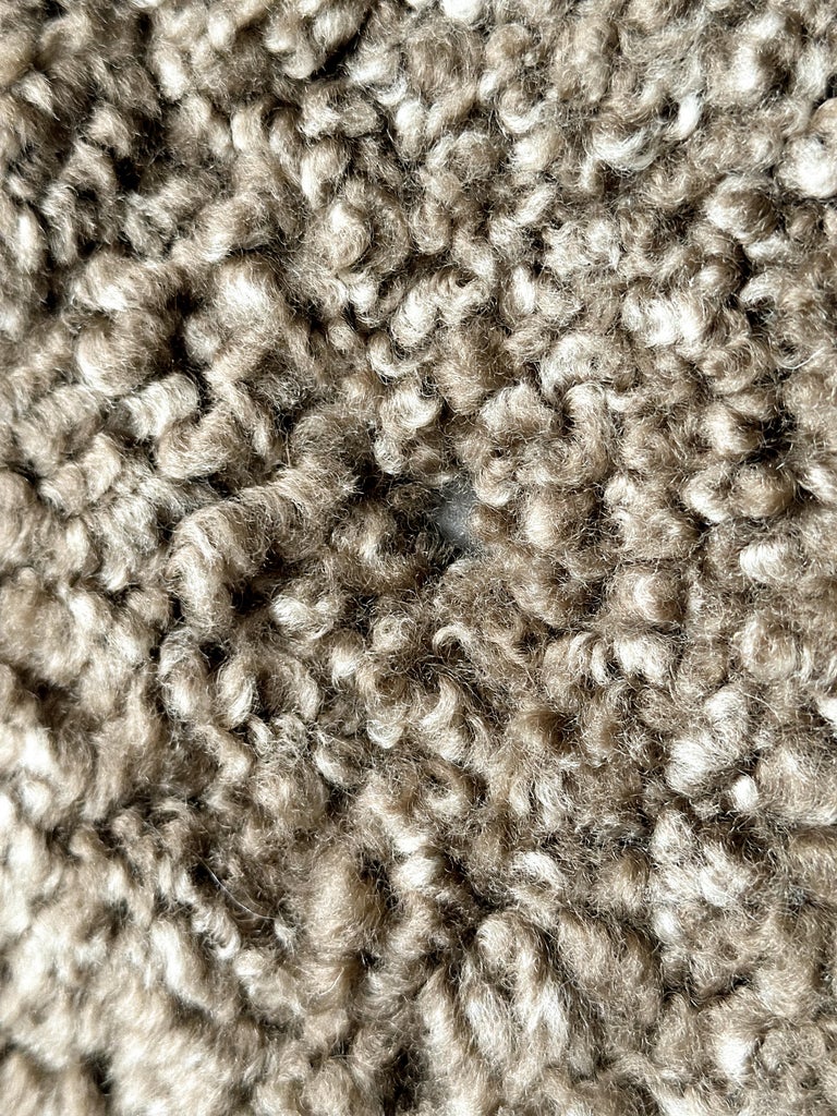 Detail of premium dark brown sheepskin upholstery