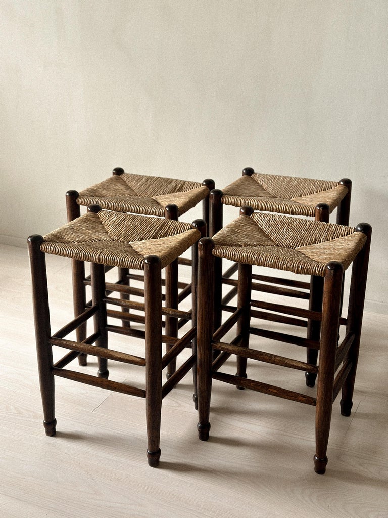 1960s French bar stools with handwoven rush seats and turned legs