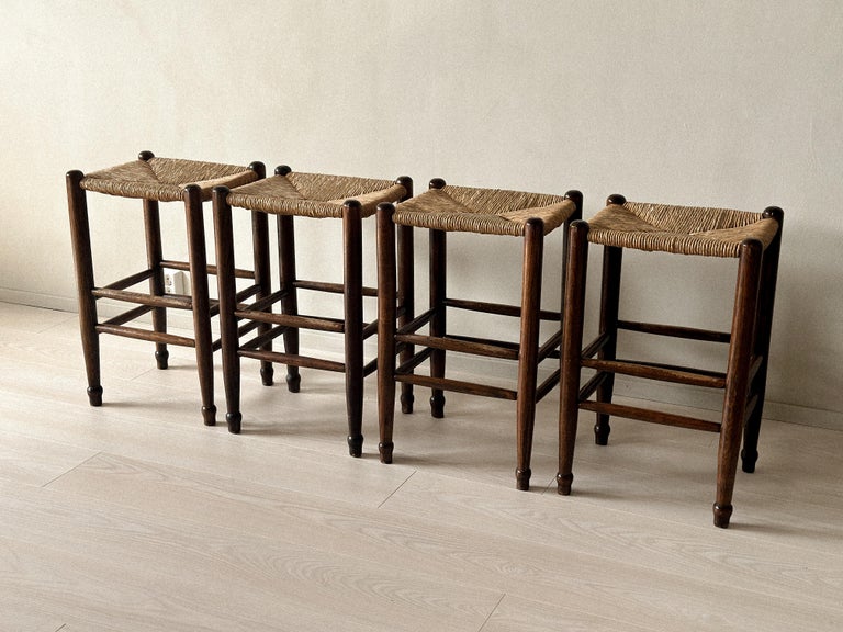 Set of four high stools with square rush seats and footrests