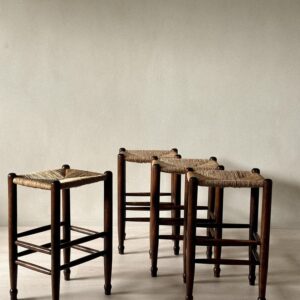 Vintage French stools with dark wood and natural rush seats