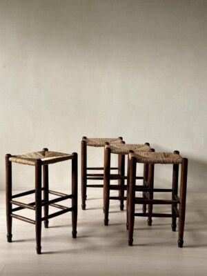 Vintage French stools with dark wood and natural rush seats