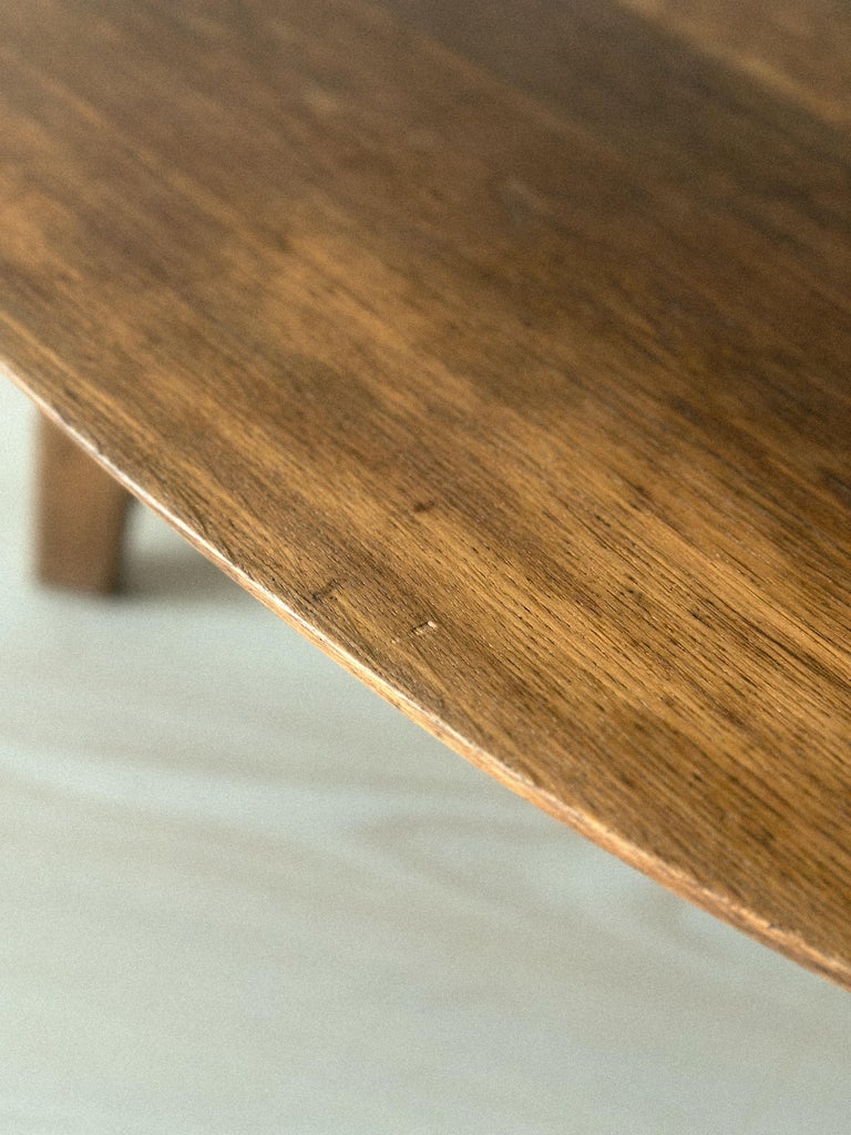 Organic mid-century table designed by Pierre Guariche in wood