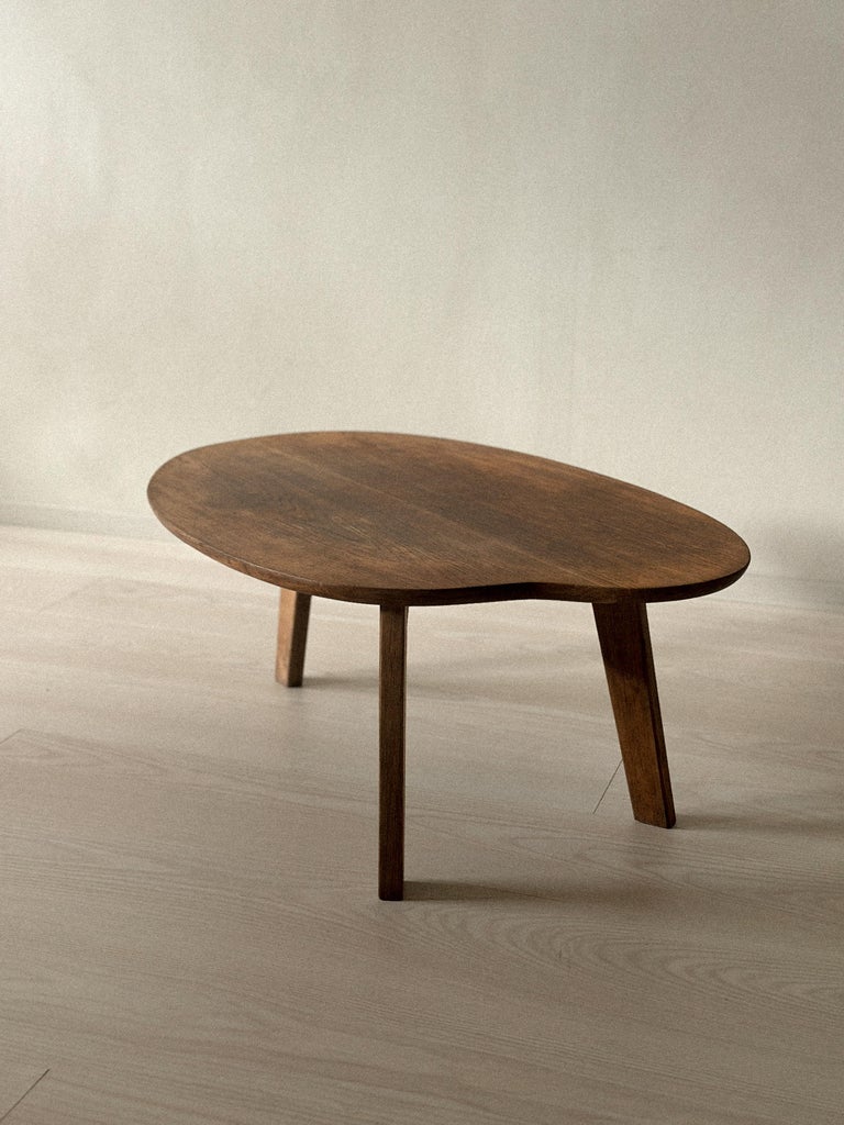Mid-century Pierre Guariche coffee table in carved solid wood