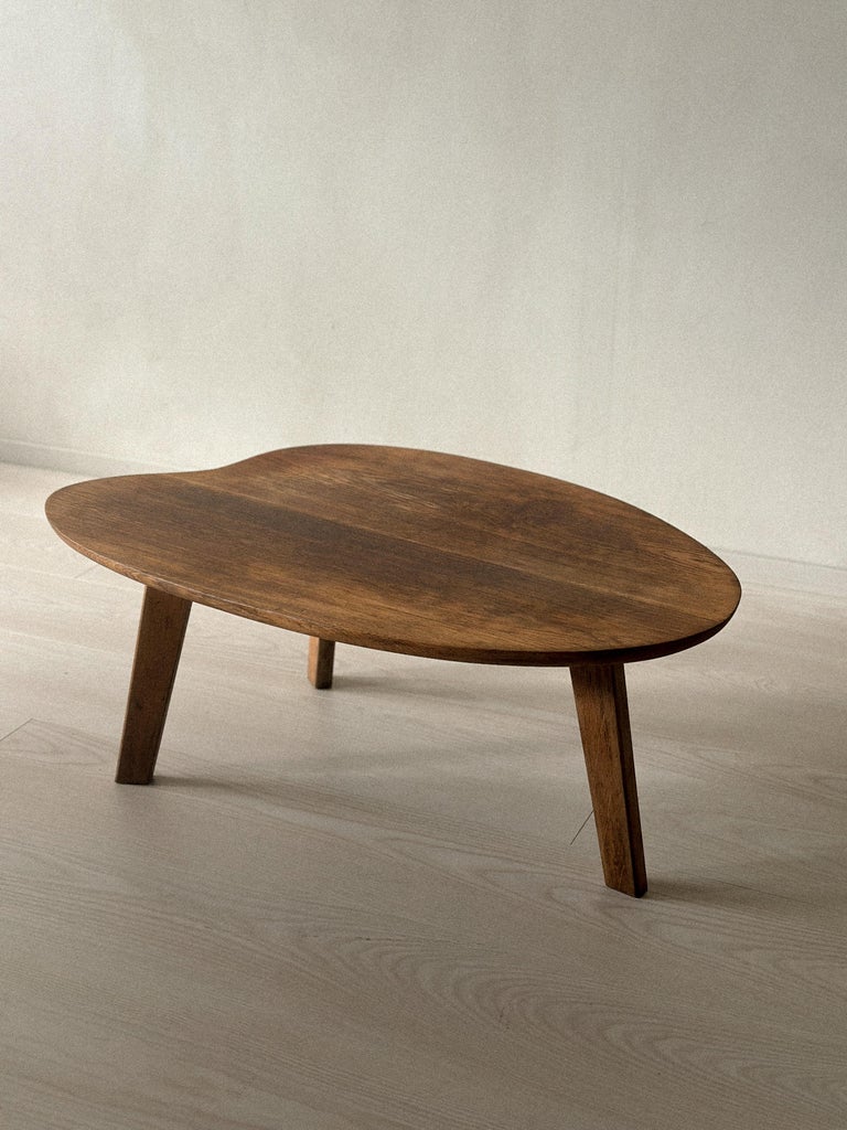 Pierre Guariche wooden coffee table with three legs and organic top