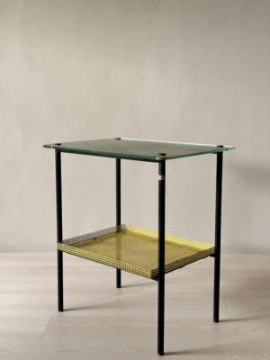 Industrial design table with green textured glass and steel tubing