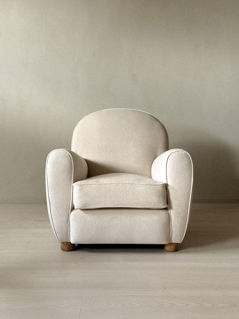 The Valette Chair with soft curved silhouette and oak legs