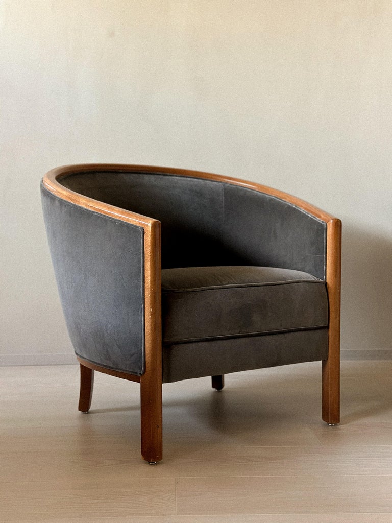 Velour egg chairs arranged as a pair