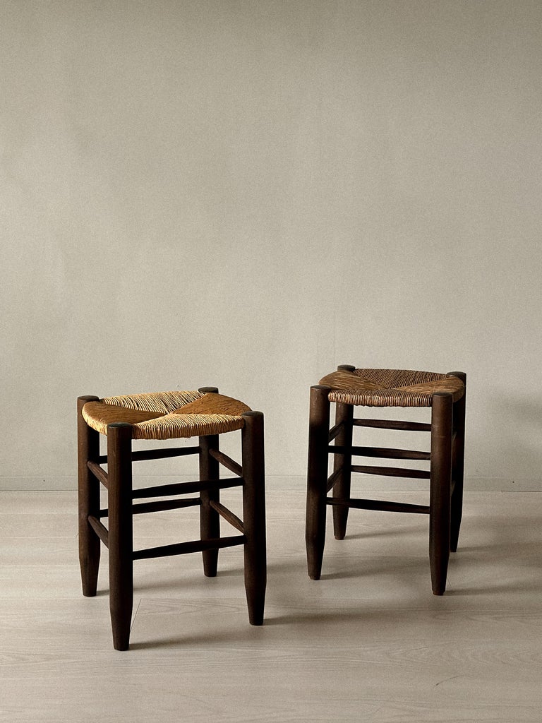 Vintage rattan stools with round seats and solid legs