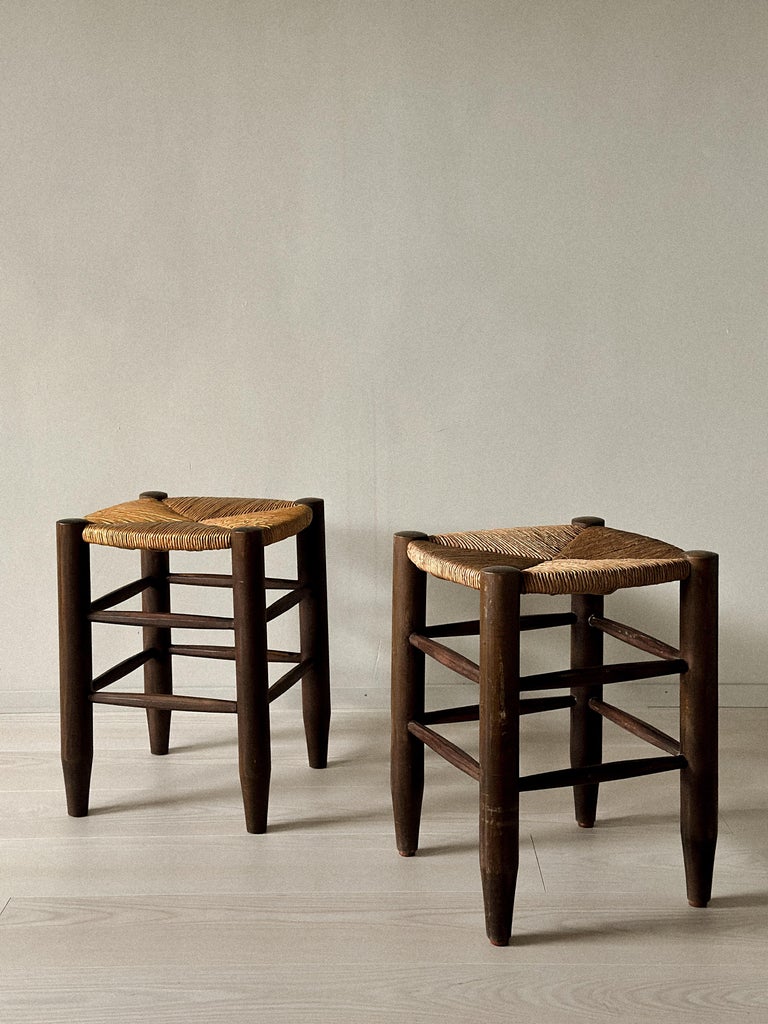 Pair of stools with rich patina and natural finish