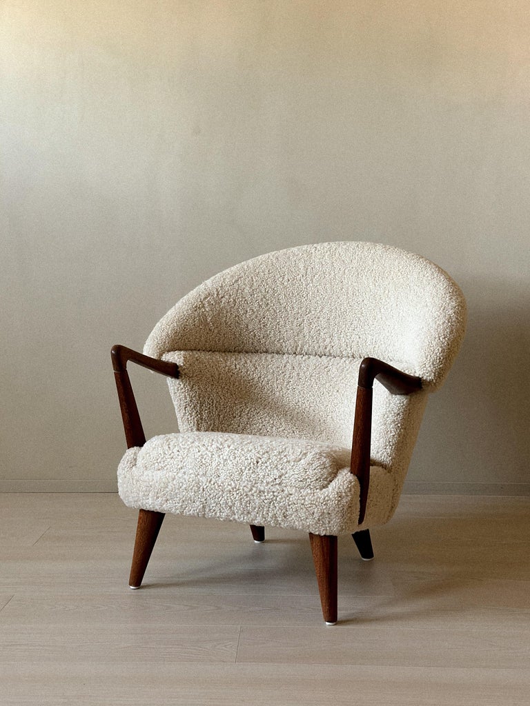 Vintage lounge chair with curved frame and soft texture