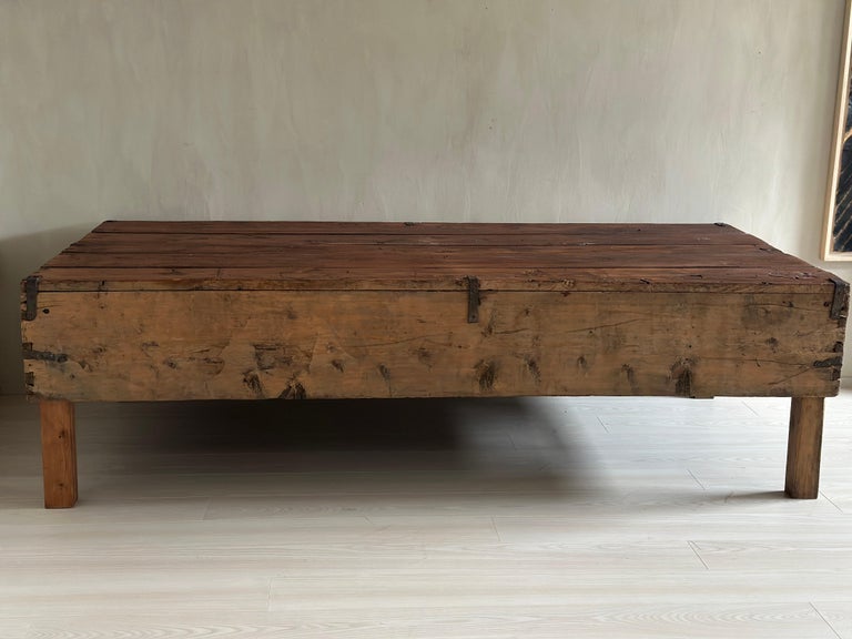 Massive antique wooden console with sculptural presence