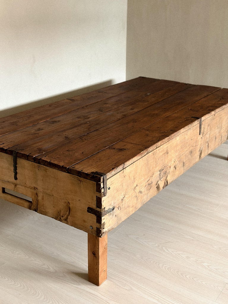 Console showing signs of historical use and rustic finish