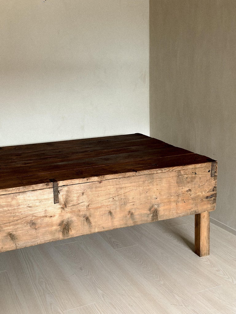 Grain chest console set against neutral wall