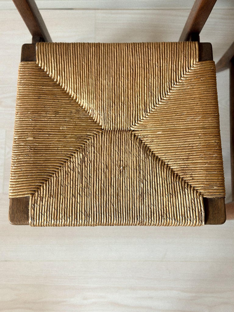 Close-up of rush seat detail on Guillerme et Chambron chair