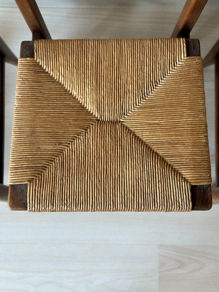 Close-up of rush seat detail on Guillerme et Chambron chair