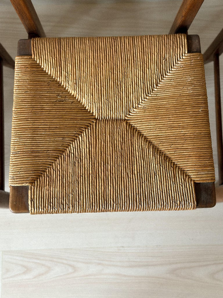 Close-up of rush seat detail on Guillerme et Chambron chair