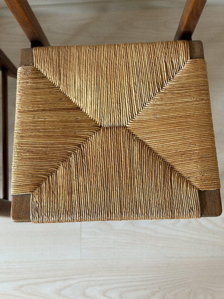 Close-up of rush seat detail on Guillerme et Chambron chair