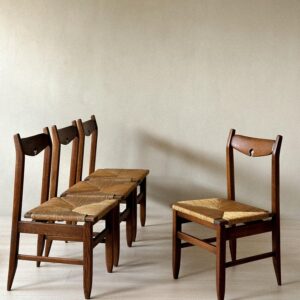 Set of four oak dining chairs with rush seats by Guillerme et Chambron