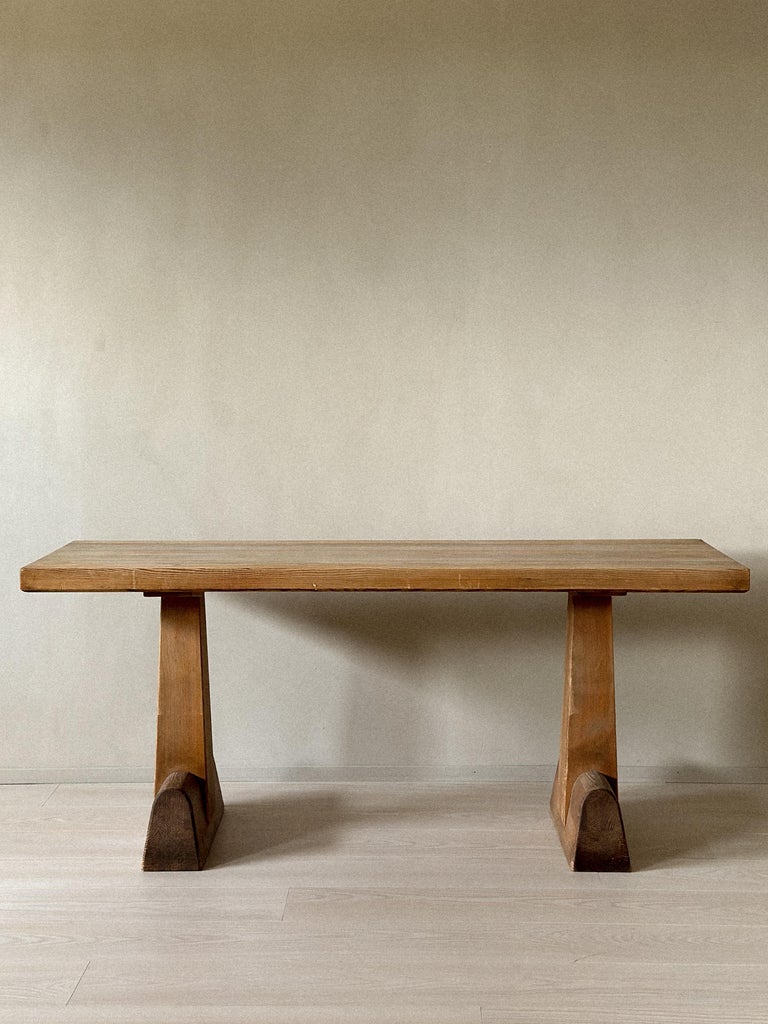 Solid pine library table with sculptural quality
