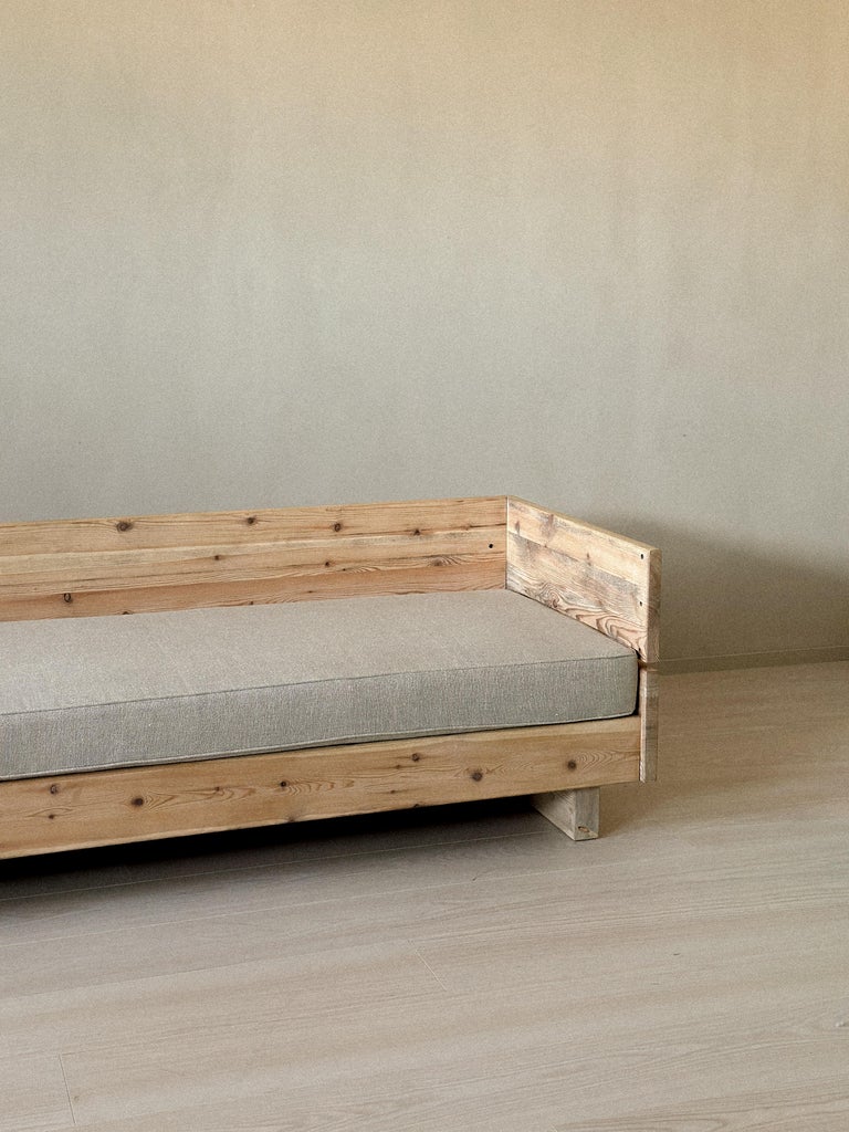 Donald Judd–style daybed with geometric wooden base