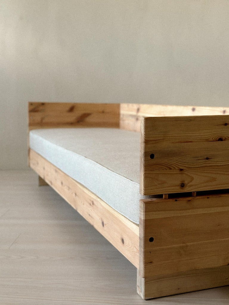 Linen cushion detail on vintage daybed