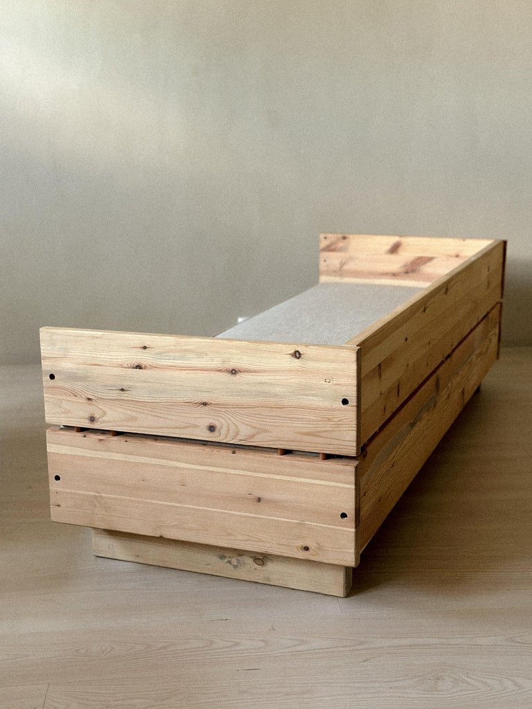 Solid pine bench or daybed with visible wood grain