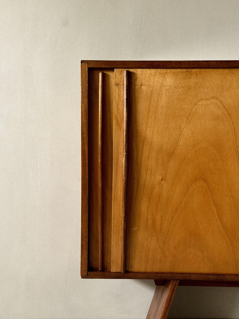 Low profile French cabinet with practical storage