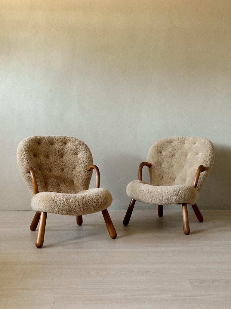Pair of vintage Clam Chairs by Arnold Madsen in shearling