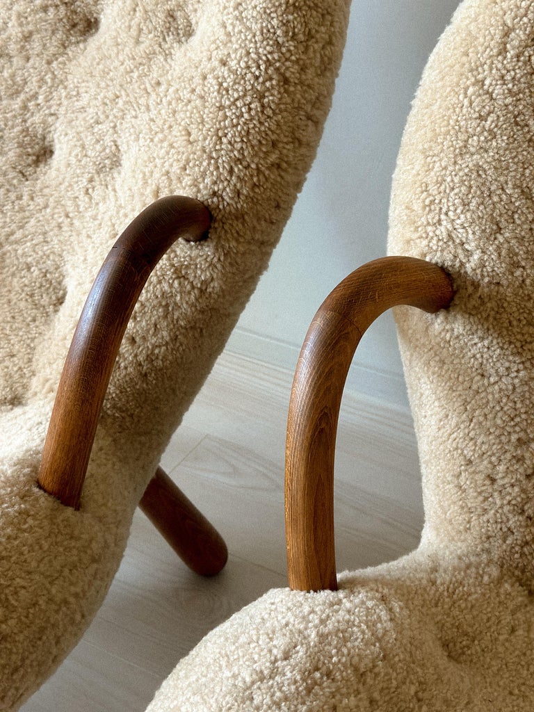 Wooden arm and frame detail on Clam Chair