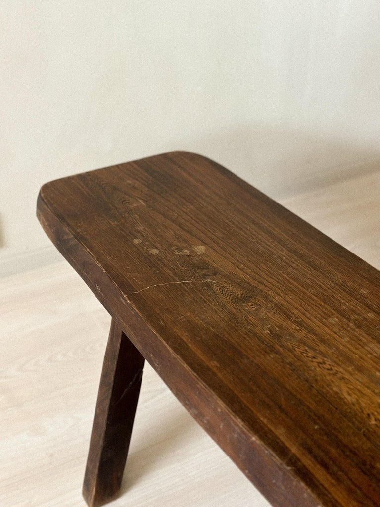 Three-quarter angle of French brutalist oak bench