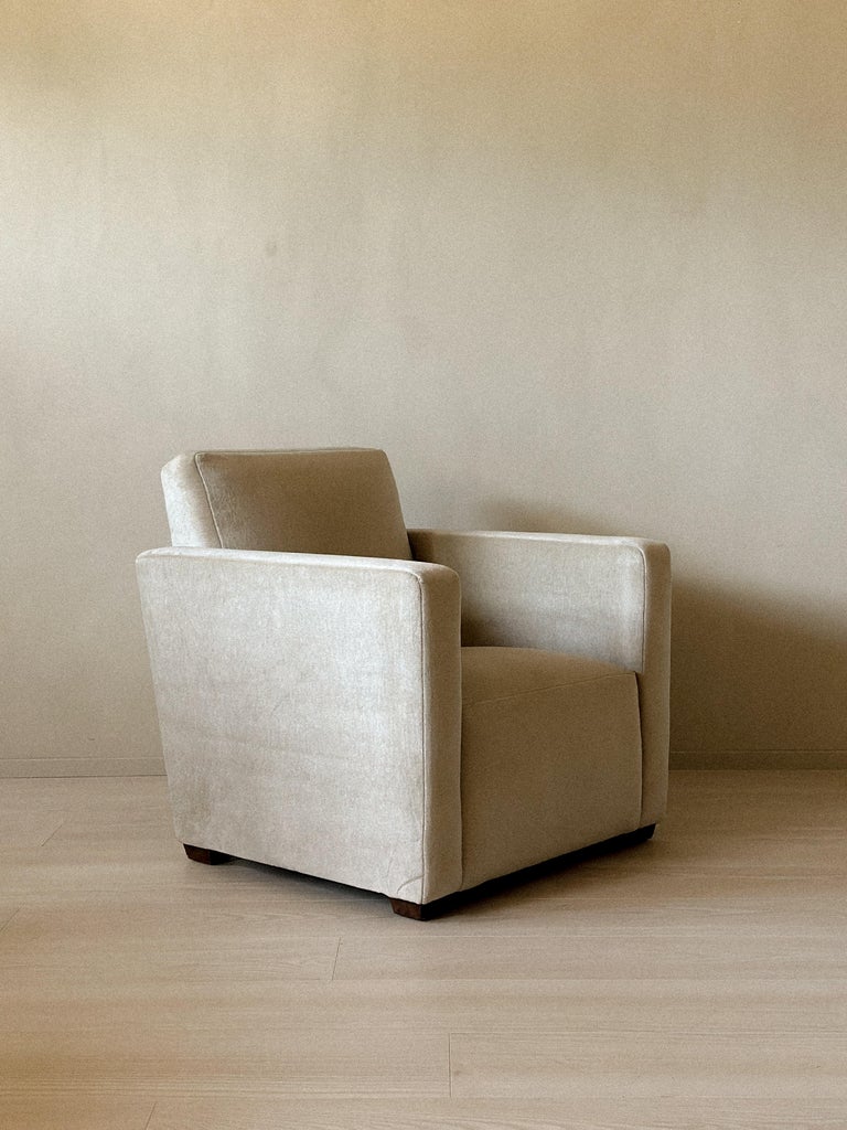 Vintage low club chair with neutral modern fabric