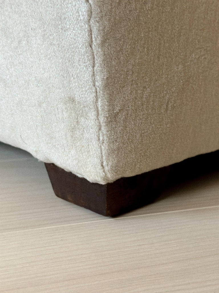 Wooden block foot detail on vintage Danish chair