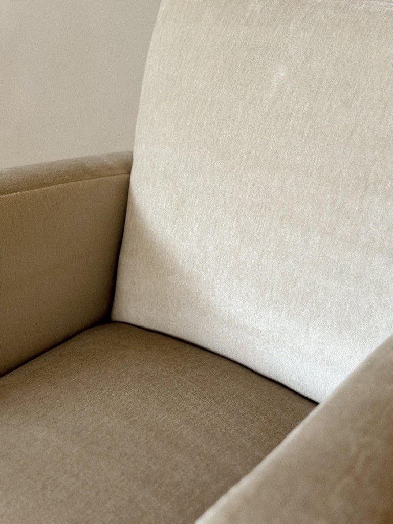 Vintage upholstered club chair with modernist simplicity