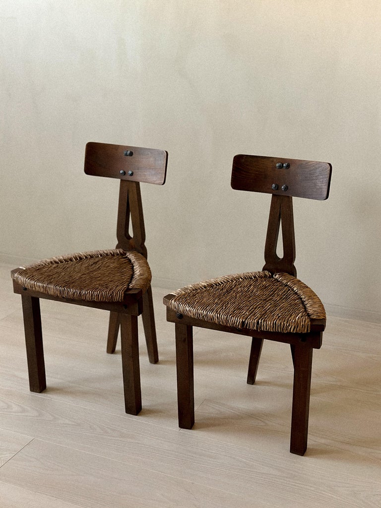 Three-quarter angle of Spanish low chairs with rush seating