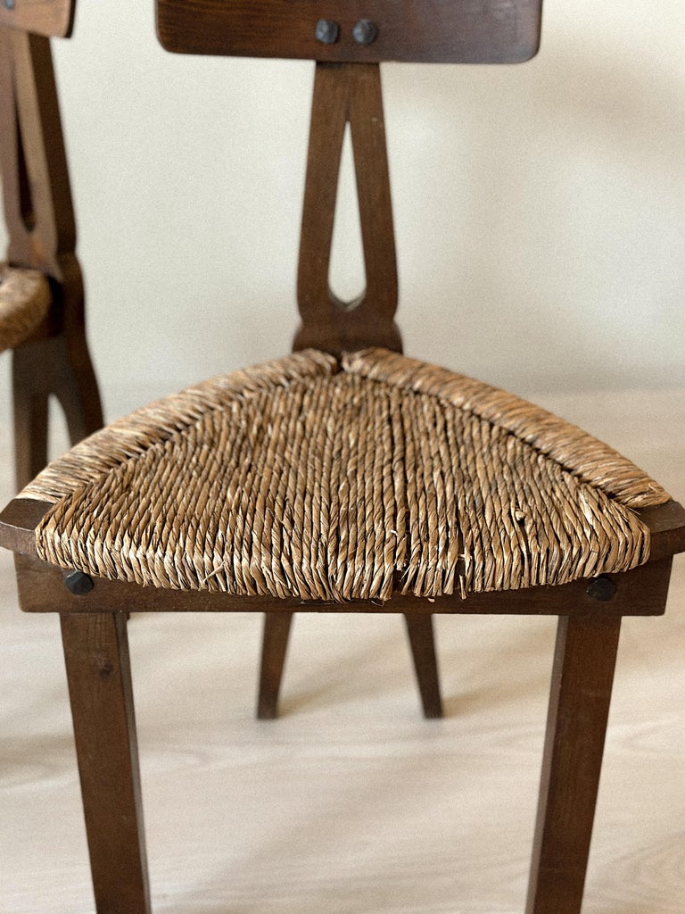 Pair of rustic Spanish chairs with low stance