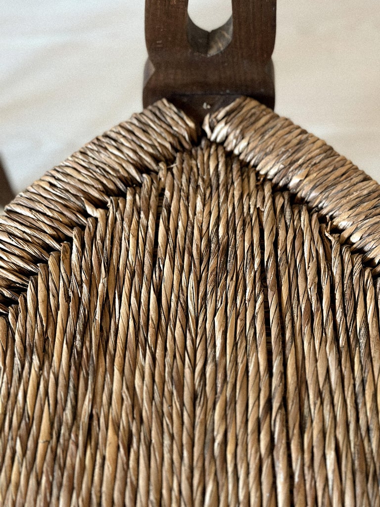 Detail of handwoven rush seat on Spanish low chair