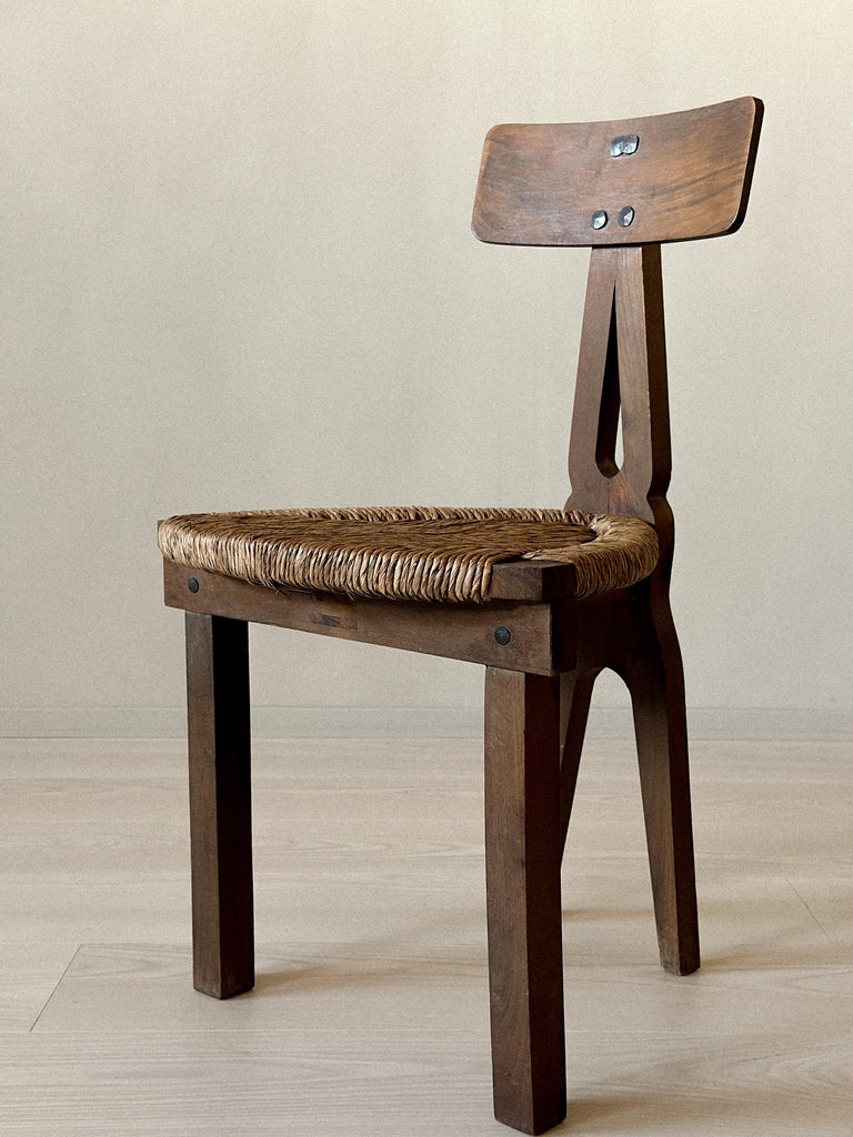 Rush seats with worn but stable condition on Spanish chairs
