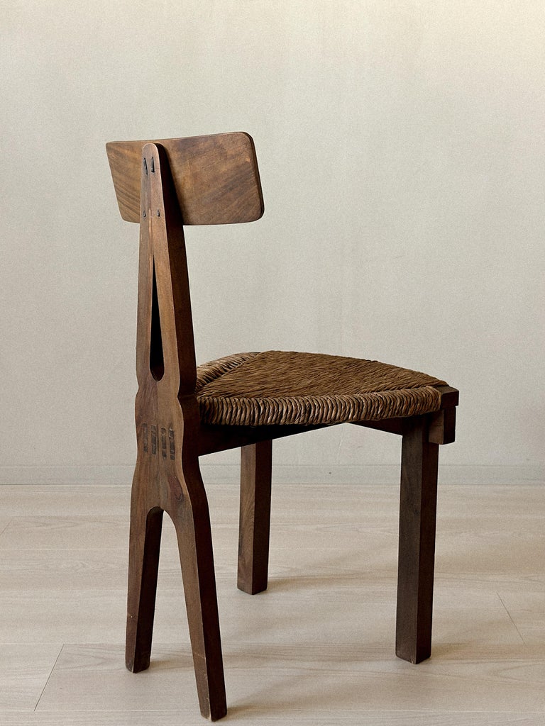 Close-up of sculpted wooden backrest on Spanish chair