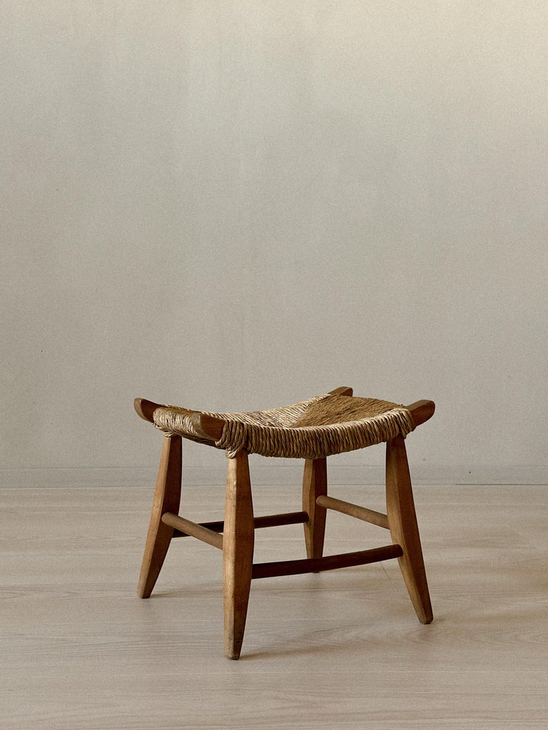 Stool with woven seat and clean lines