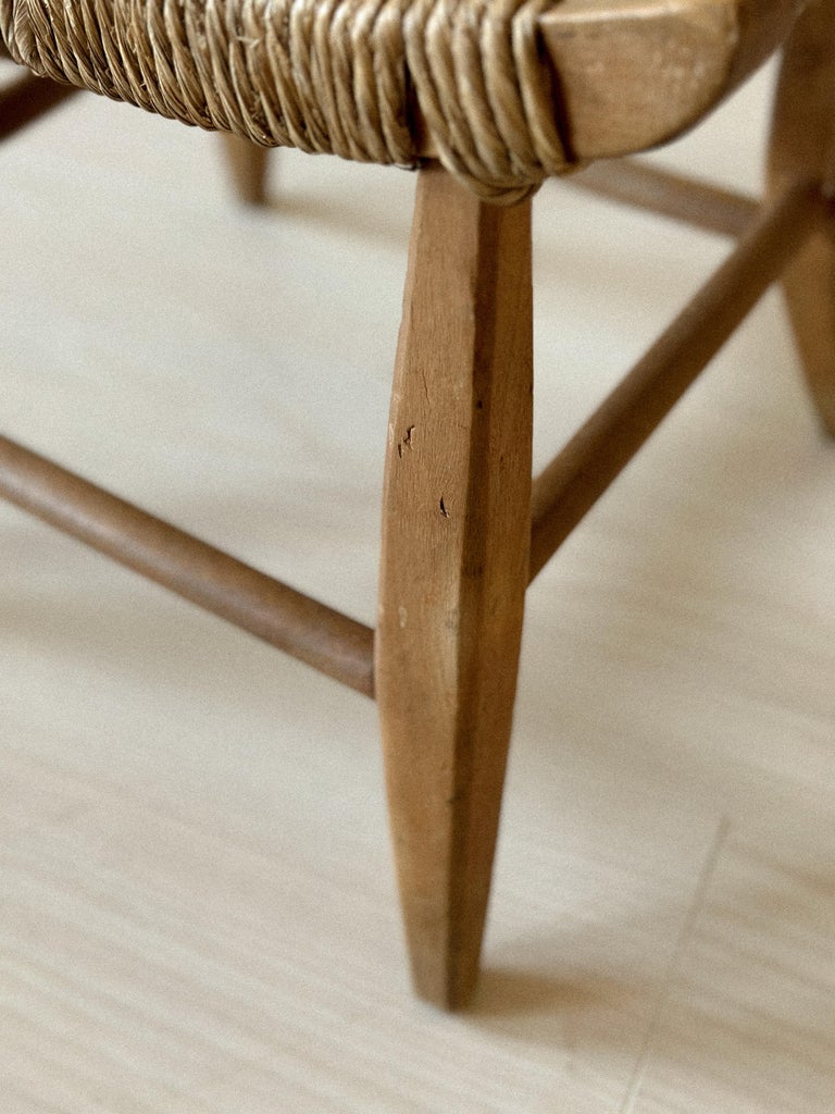 Woven-top stool with warm wood frame